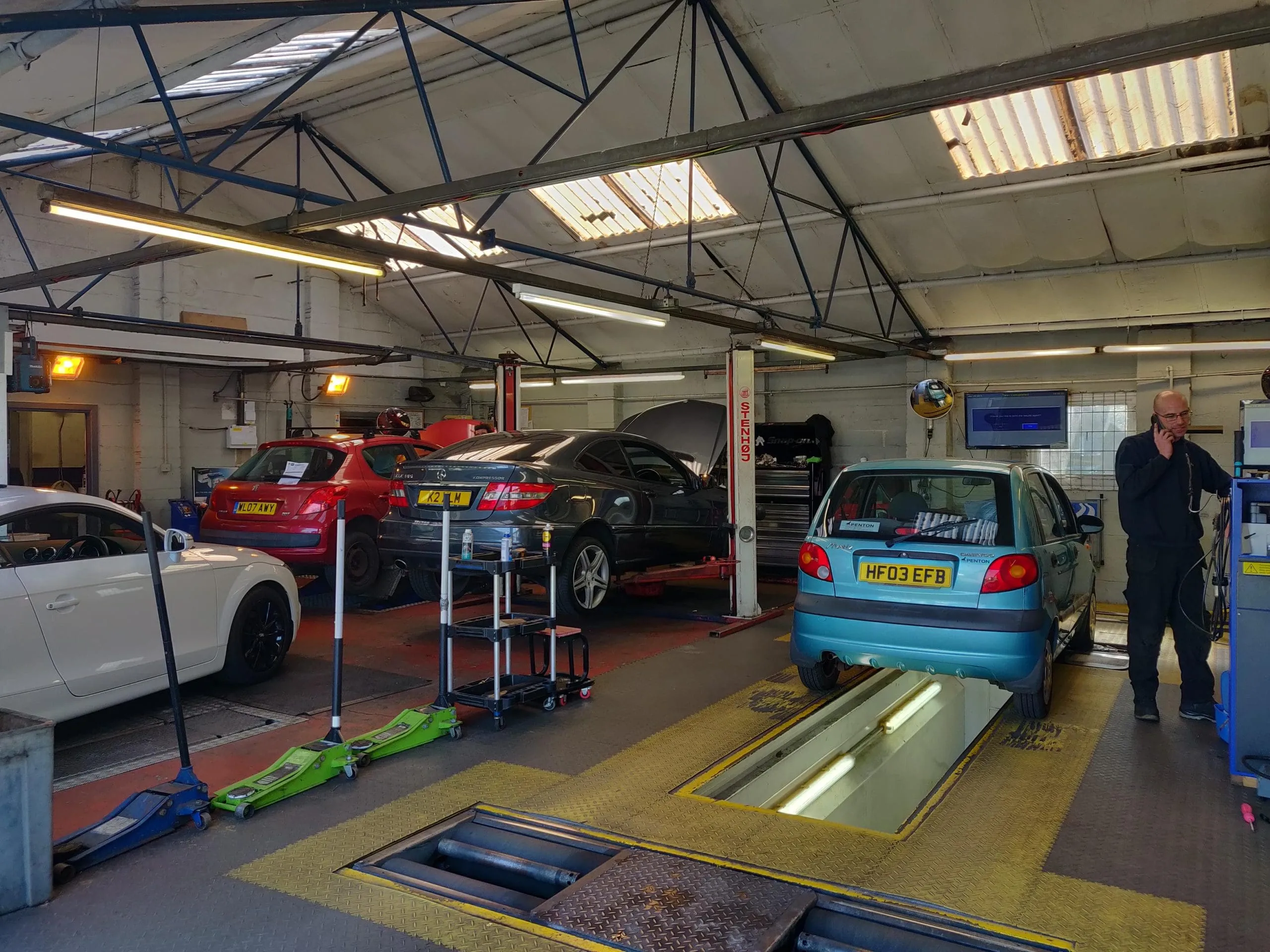 Inside the Carwise workshop: cars on the lifts and the MOT pit