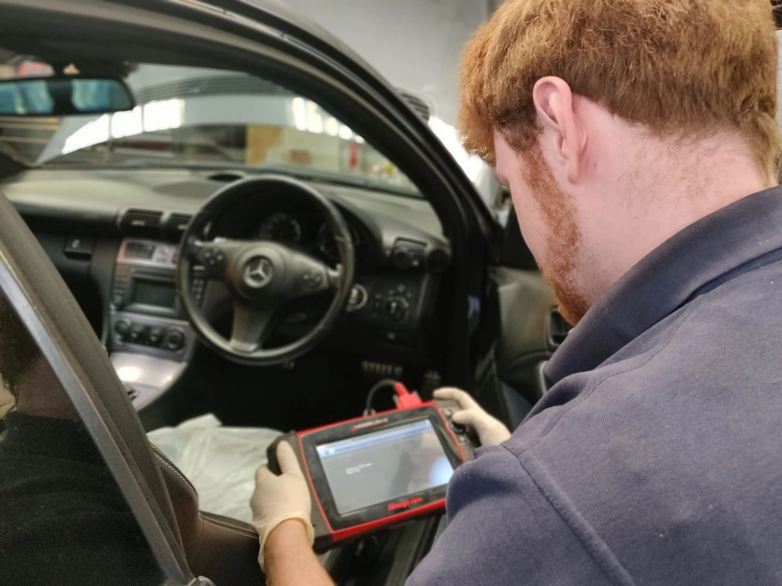 Diagnostics being run on a Mercedes